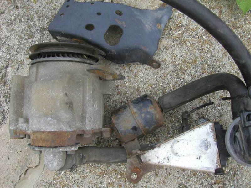 Smog pump assembly and alternator bracket from 1986 camaro iroc z/28