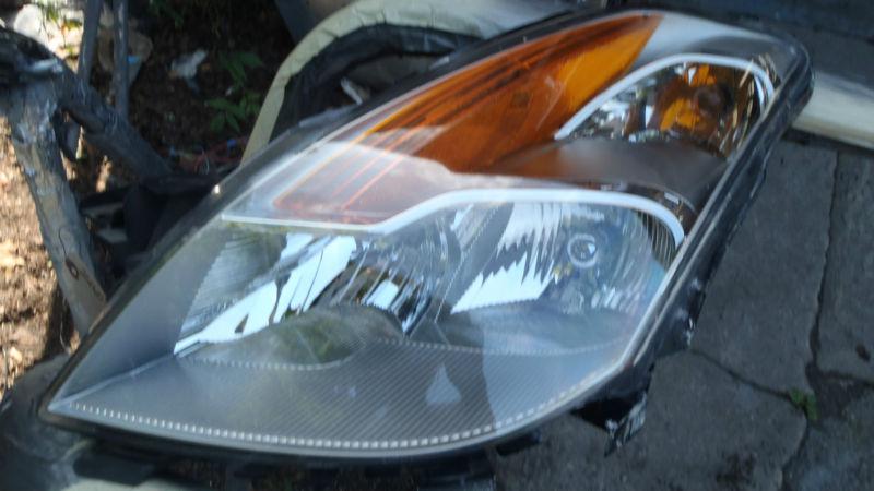 2008 -2009 nissan altima coupe lt headlamp used like new