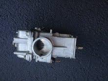 Mikuni carburetor, flat slide. 