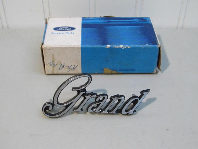 Nos 1975,1976,1977 mercury gran marquis "grand" front fender emblem