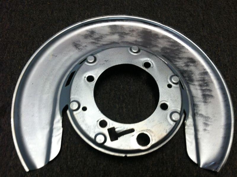 1965-82 corvette left rear brake caliper back plate shield 3864067 **original**