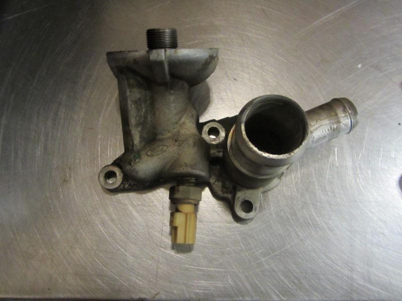 Find WK005 OIL FILTER HOUSING 2004 FORD F150 5.4 3 VALVE in Arvada