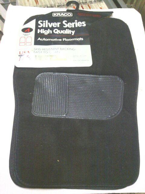 Nors: 4-piece front & rear skid resistant black carpeted floor mats:made in usa