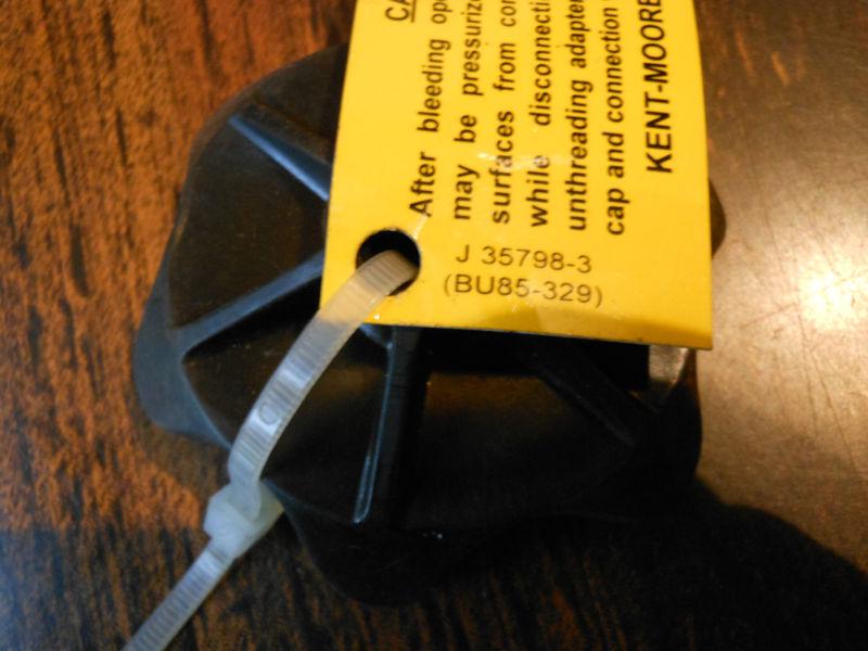 Kent moore j-35798-3 part of pressure bleeder adapter with safety directions   