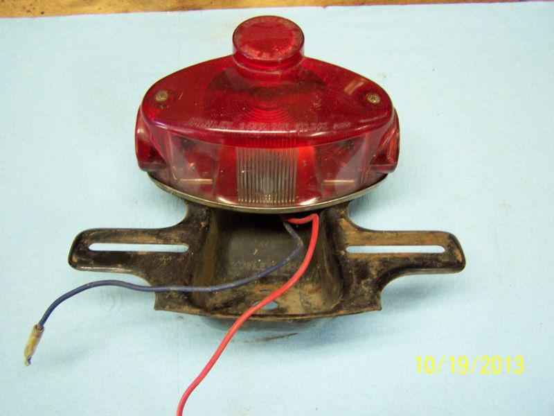 Kawasaki 1971 h1 500 rear tail light with mounting bracket  machiii 1971