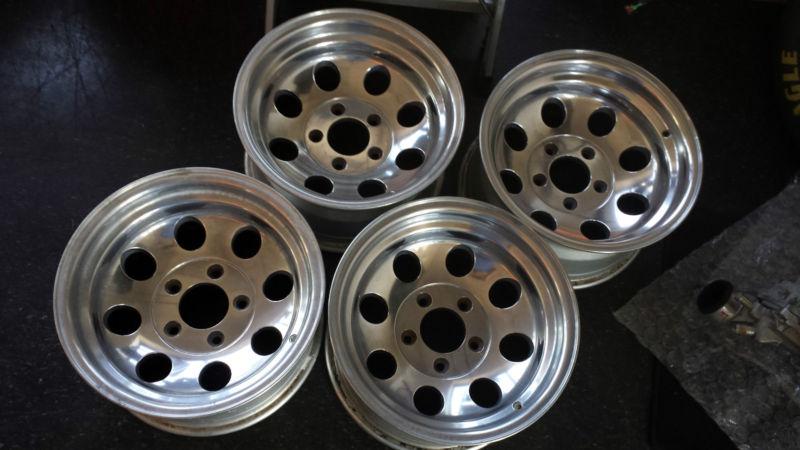 Set of 4 15 inch  aluminum rims with chrome center caps
