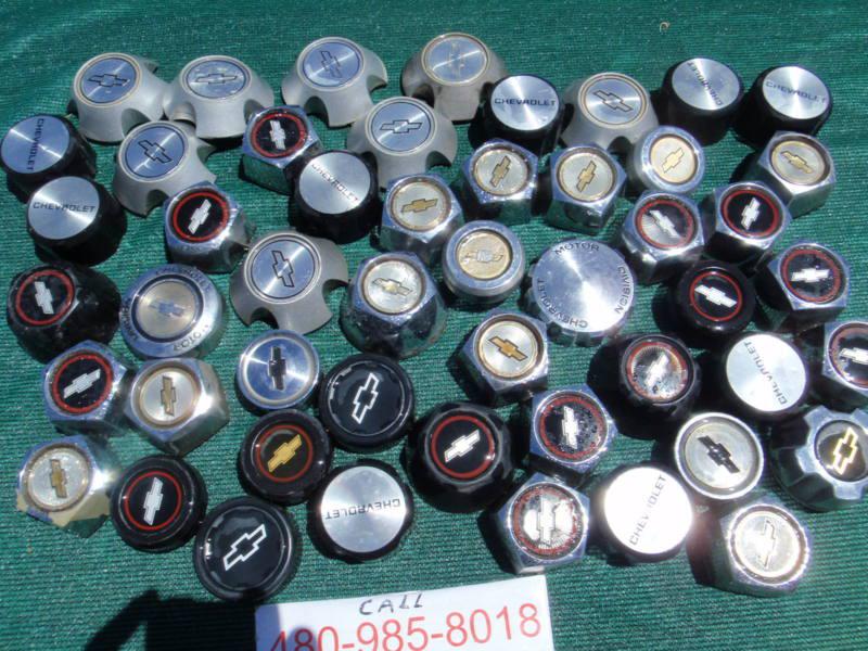 Sell LOT OF 50 CHEVY CHEVROLET WHEEL RIM CENTER HUB CAPS HUBCAPS OEM