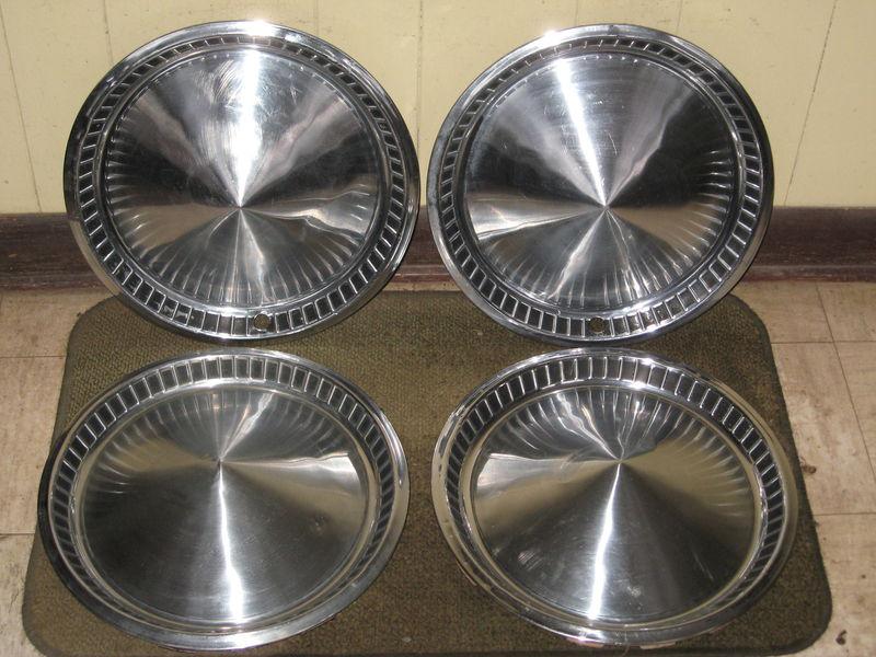 1957 plymouth hub caps 14" wheel covers set of 4