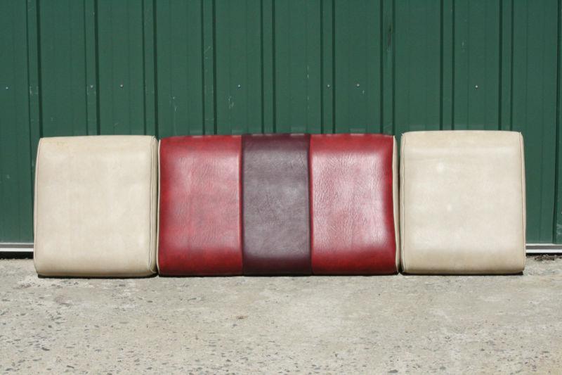 Boat interior (rear seat cushions) tan, red & maroon 