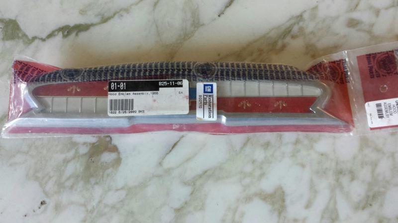 55 1955 chevy  hood emblem bezel assembly