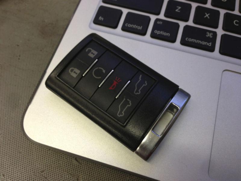 Oem cadillac smart key keyless remote fob transmitter /memory #1