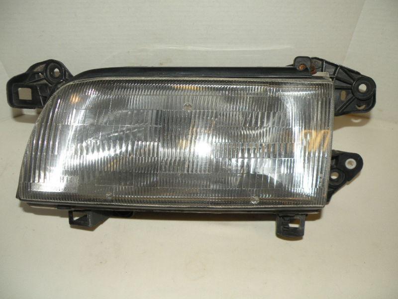 1989-1995 mazda mpv van headlight assembly  left side  oem