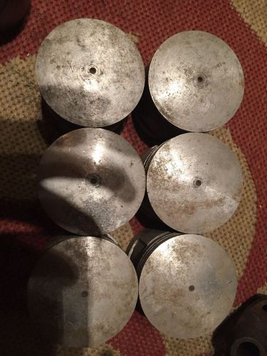 Pistons new never used , possibly ford , john deere packard lincoln chevy hudson