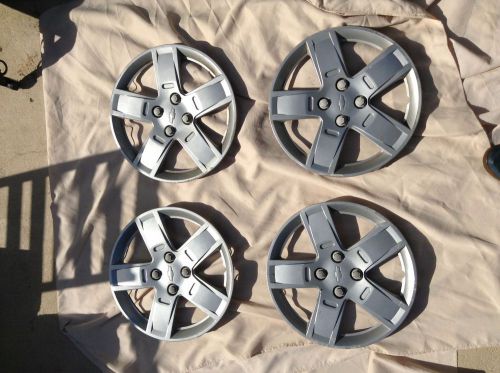 Set of 4 oem 2009-2011 chevrolet aveo 15&#034; wheel covers hubcaps