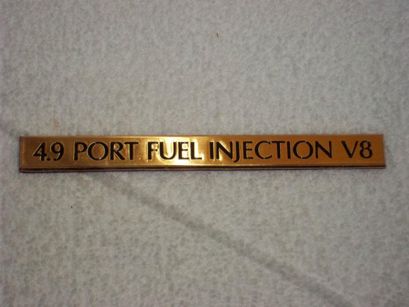 Original gm nos new gold 91-93 eldorado deville fleetwood 4.9 liter trunk emblem