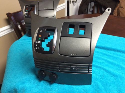 2004 - 2010 toyota sienna shift bezel drink insert dc outlet w/ heated seat slot