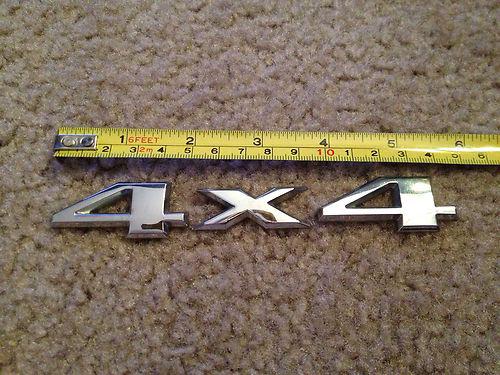 Used genuine oem rear liftgate "4x4" emblem for many jeep models listed