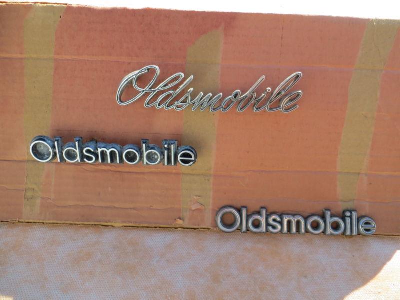 1973-1977 oldsmobile " cutlass " grill + trunk lid emblems