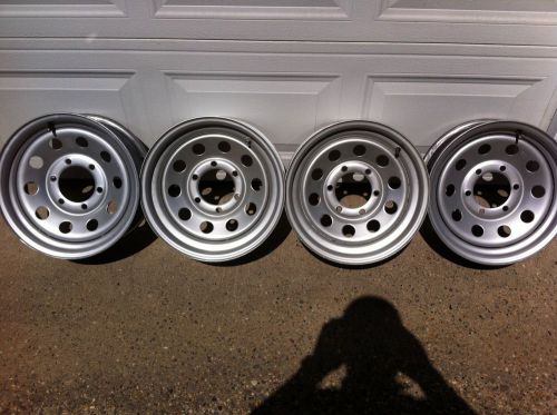 Set of 4 trailer wheels, 15" rims 6 lug nut pattern