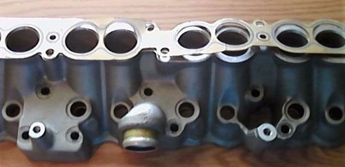 Nos right side fuel injector housing gm oem 91 92 c4 corvette zr1 lt5