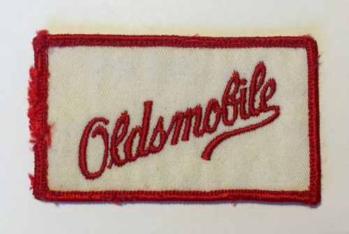 Vintage oldsmobile embroidered patch - red on white - 3.375&#034; x 2&#034; (8.6cm x 5cm)