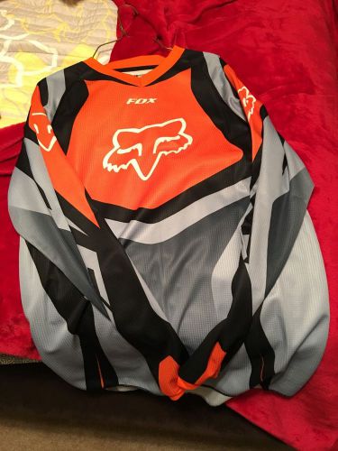Medium orange and black fox racing jersey