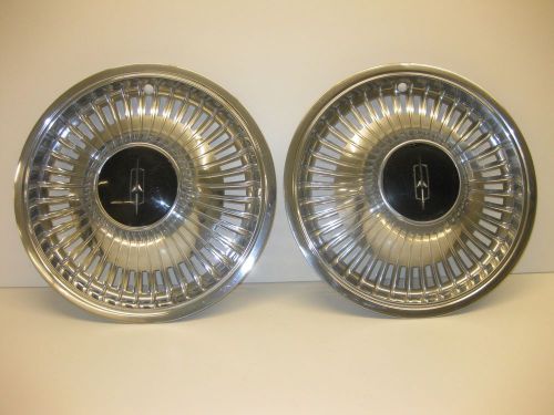 1974 oldsmobile cutlass hubcaps (2) good &amp; rare 1976 1977 75 omega maybe car art
