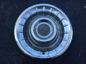 1950`s 60`s cadillac hub cap - garage display - man cave