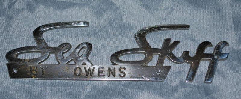 Original sea skiff by owens boat metal  marquee emblem