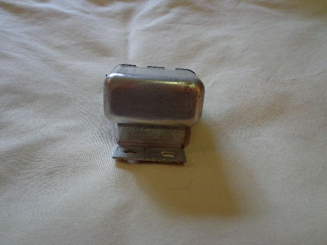 61-67 lincoln convertible only deck unlock open relay behind seat c1vf-15672-d 