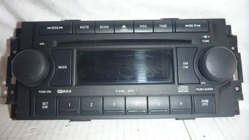 04-10 chrysler dodge jeep radio 6 disc cd face plate control panel p05064010al