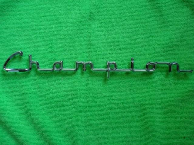 Nos 1956-58 studebaker champion script 1314301w