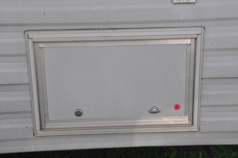 Used 20 x 12 1/2  compartment door horse trailer toy hauler& rv with key