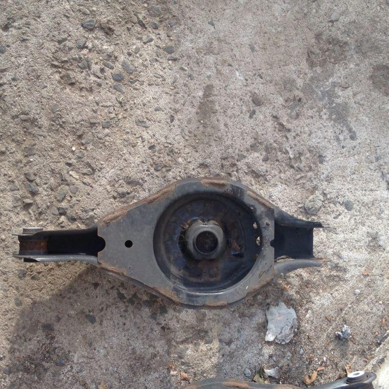 04 05 06 07 08 nissan maxima passenger rear spring seat right lower control arm