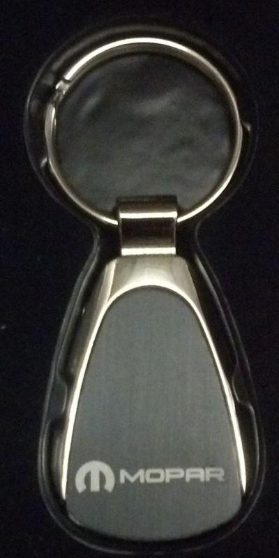 Mopar keychain with classic "m" in black inlay teardrop shape 