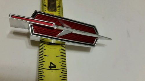 Nos 1968 68 69 oldsmobile cutlass fender emblem