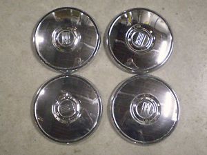 Used vintage 4 fiat chrome wheel covers hub caps