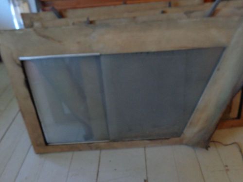 2 sets of antique vintage jeep? heavy sliding glass windows with material