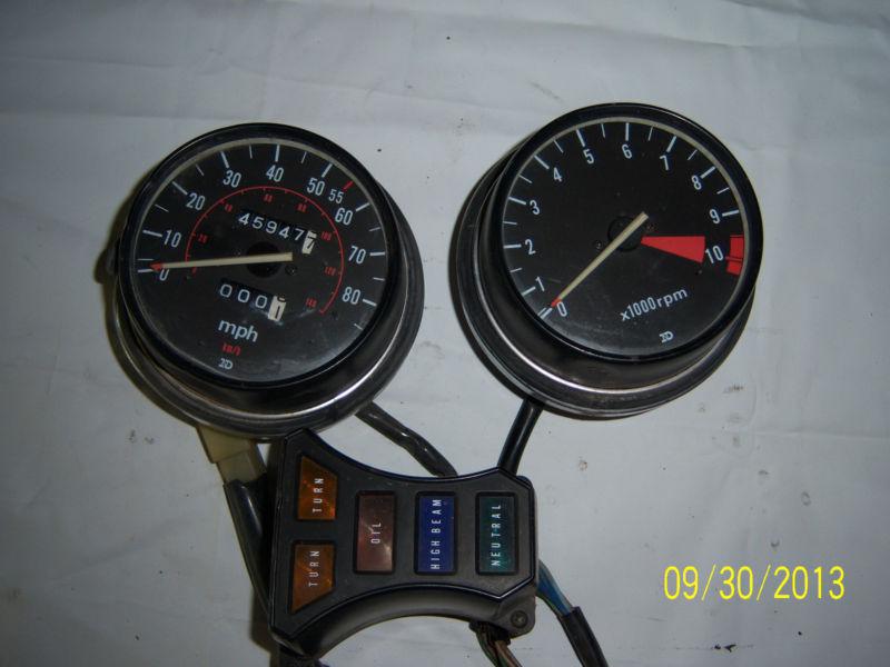 Honda speedometer, tack and indicator lights.