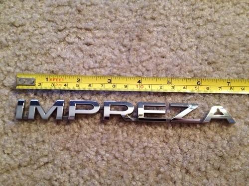 Used in excellent condition oem subaru "impreza" emblem