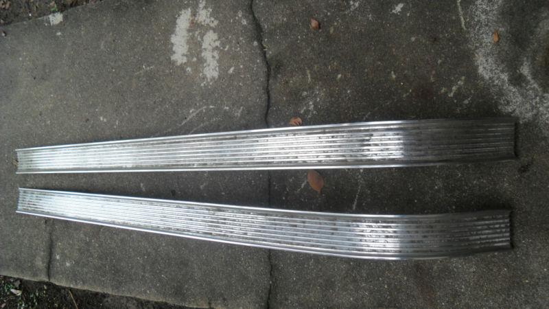 1956 pontiac hood badges