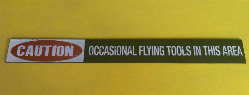  caution occasional flying tools in this area metal sign man cave vintage style!