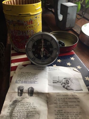 Vintage stewart warner tachometer gauge with instructions in origianal tin