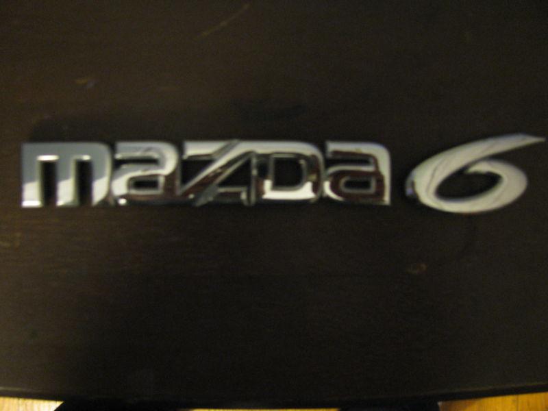 Mazda 6 trunk emblem 2006