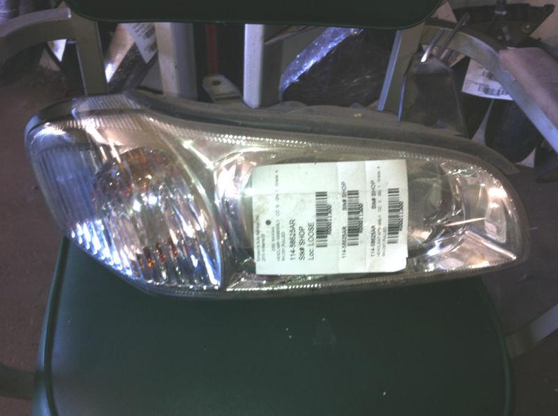 00 01 nissan maxima  right headlight 