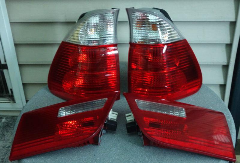 04 05 06 bmw x5 e53 tail lights red-clear oem complete set 4 pcs