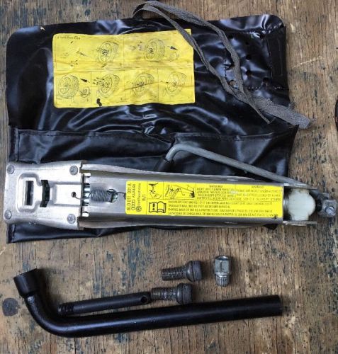 00-05 vw  jetta  jack and tools with storage case and wheel locks.