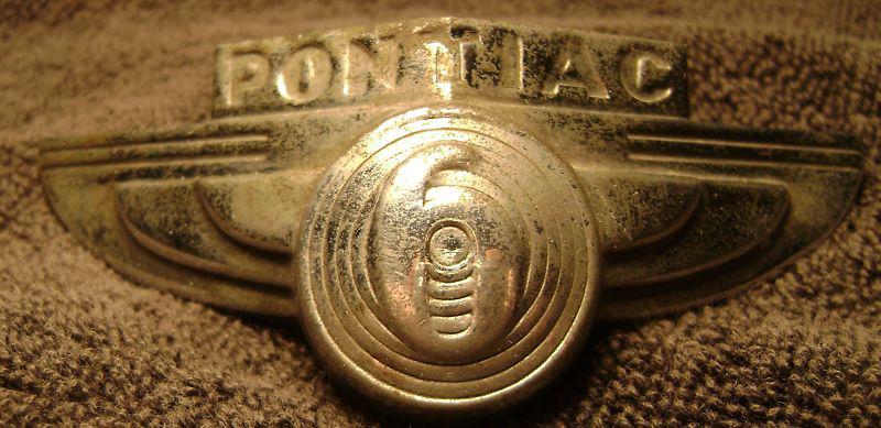 Antique pontiac hood emblem 