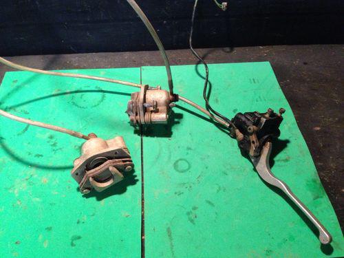 06 polaris outlaw 500 front brake assembly 