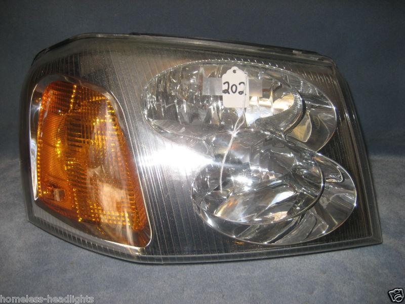 02 03 04 05 06 07 gmc envoy oem passenger rt headlight used factory #202